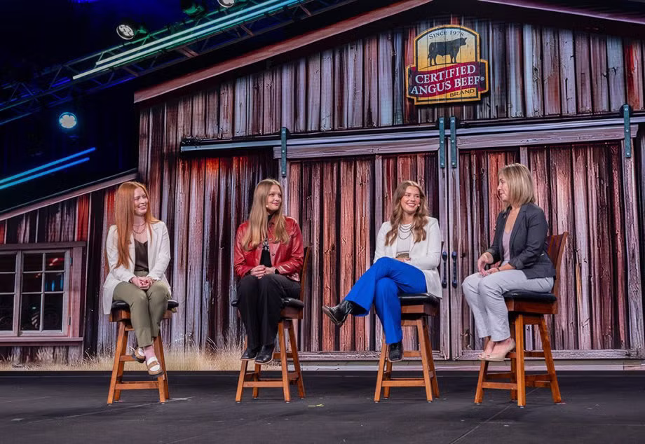 4 women sitting down for a panel